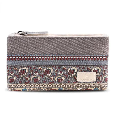 Mandotos Canvas Chic Artisan Purse with colorful woven design and leather strap, stylish handmade bag for casual or elegant looks.