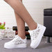 Mandotos women's canvas shoes featuring a casual, stylish design with comfortable fit and trendy white and black color options.
