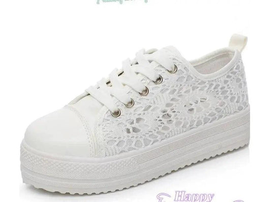 Mandotos women's canvas shoes featuring a casual, stylish design with white laces and a comfortable sole.