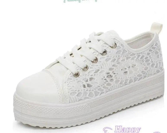 Mandotos women's canvas shoes featuring a casual, stylish design with white laces and a comfortable sole.