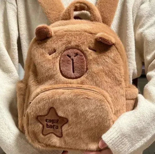 Mandotos Capybara Cuddle Backpack featuring a soft, plush design and adorable capybara face for comfortable carrying and cuddling.