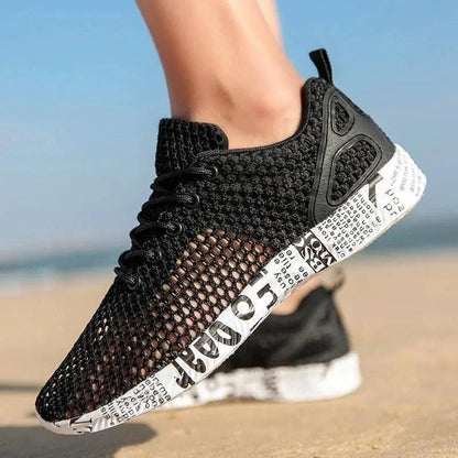 Mandotos casual men's breathable sneakers with hollow lace-up design and board sole, stylish and comfortable for everyday wear.