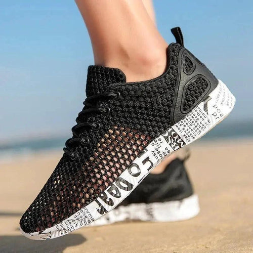 Mandotos casual men's breathable sneakers with hollow lace-up design and board sole, stylish and comfortable for everyday wear.