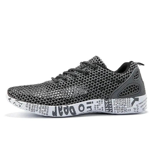 Mandotos men's casual breathable sneakers with hollow lace design, ideal for comfortable everyday wear.