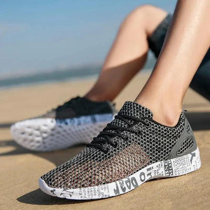 Mandotos casual men's breathable sneakers with hollow lace design, perfect for everyday comfort and style.