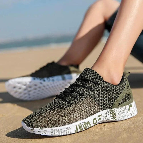Mandotos men's casual breathable sneakers with hollow lace design, perfect for comfortable everyday wear
