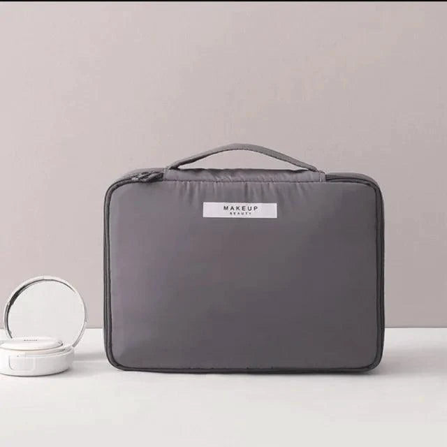 Mandotos Chic Beauty Bag Organizer with multiple compartments for cosmetics and personal items, in sleek design.