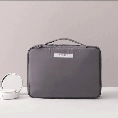 Mandotos Chic Beauty Bag Organizer with multiple compartments for cosmetics and personal items, in sleek design.