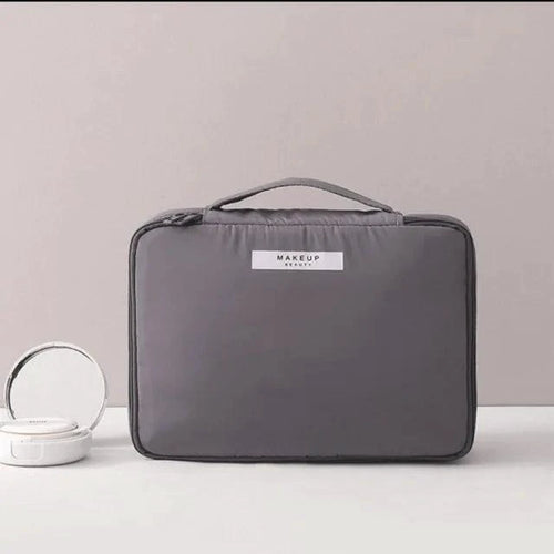 Mandotos Chic Beauty Bag Organizer with multiple compartments for cosmetics and personal items, in sleek design.
