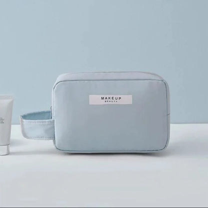 Mandotos Chic Beauty Bag Organizer with multiple compartments for cosmetics and toiletries, compact and stylish for travel.