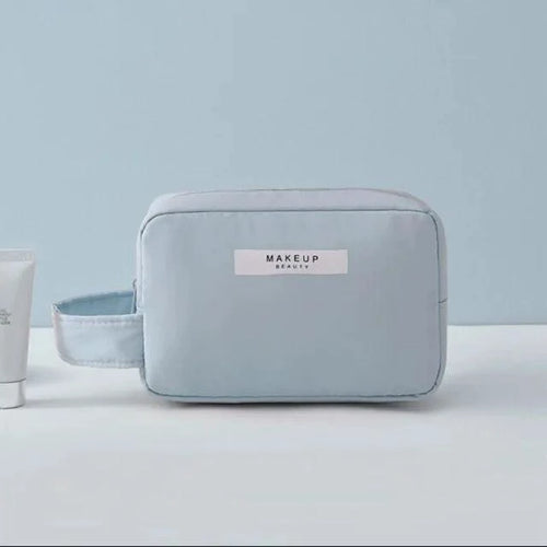 Mandotos Chic Beauty Bag Organizer with multiple compartments for cosmetics and toiletries, compact and stylish for travel.