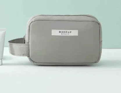 Mandotos Chic Beauty Bag Organizer with multiple compartments for cosmetics and toiletries, compact and stylish design.