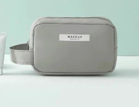 Mandotos Chic Beauty Bag Organizer with multiple compartments for cosmetics and toiletries, compact and stylish design.