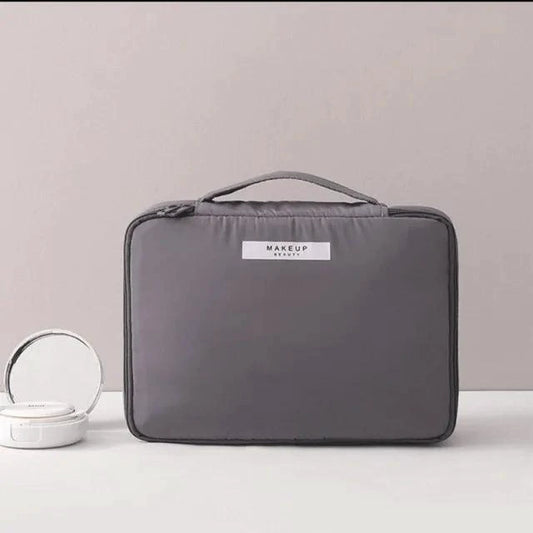 Mandotos Chic Beauty Bag Organizer with multiple compartments for cosmetics and toiletries, compact and stylish for travel.