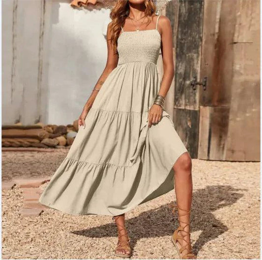 Mandotos chic chiffon layered swing dress displayed on a hanger, showcasing its flowing fabric and stylish design.