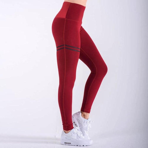 Mandotos chic gold print leggings featuring a stylish gold pattern on black stretchy fabric for a fashionable fit.