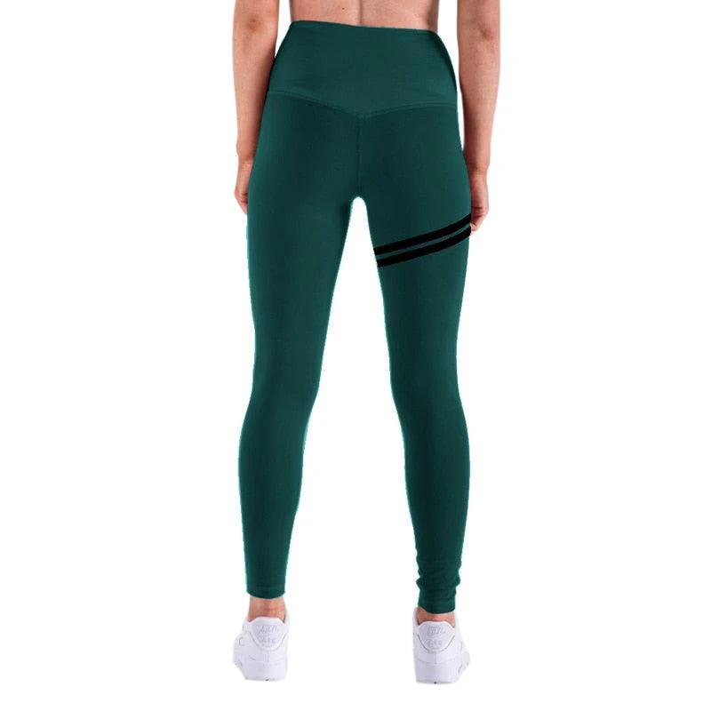 Mandotos chic gold print leggings featuring a stylish gold pattern on black stretchy fabric for a modern, fashionable look.