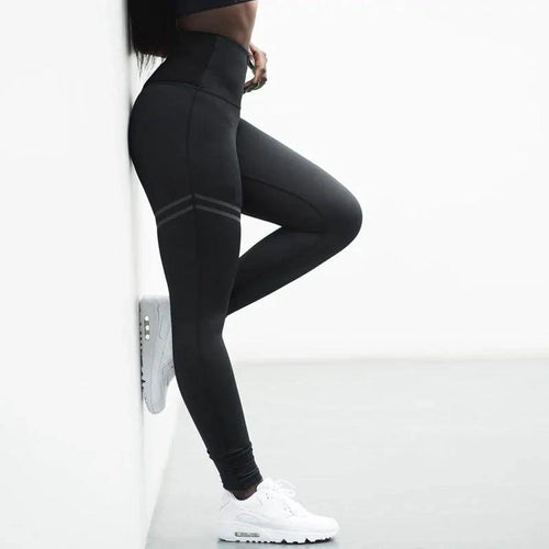 Mandotos chic gold print leggings featuring a stylish pattern, form-fitting design, and comfortable stretch fabric.