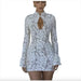 Mandotos chic hollow-out bell sleeve dress featuring stylish cutouts and flowing fabric, perfect for elegant occasions.