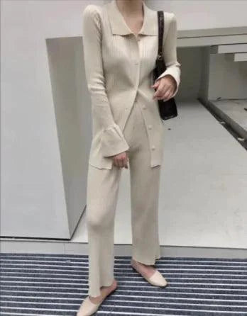 Mandotos chic knit collared ensemble featuring a stylish knit top and matching bottom in a cozy, fashionable design.