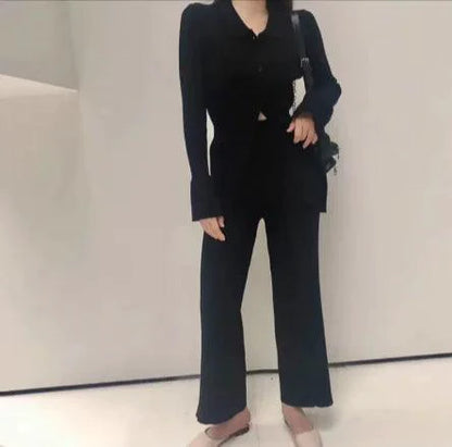 Mandotos chic knit collared ensemble featuring a stylish knitted top and matching pants, perfect for casual or semi-formal wear.