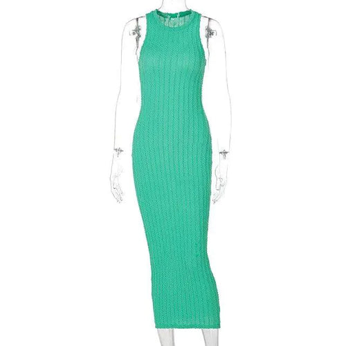 Mandotos chic knitted tank sweater dress with a fitted silhouette and ribbed texture, perfect for stylish winter outfits.