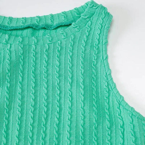 Mandotos chic knitted tank sweater dress with a fitted silhouette and cozy texture, perfect for casual and stylish wear.