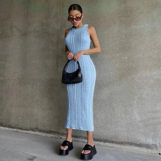 Mandotos chic knitted tank sweater dress featuring a fitted silhouette and cozy knit fabric, perfect for stylish winter wear.