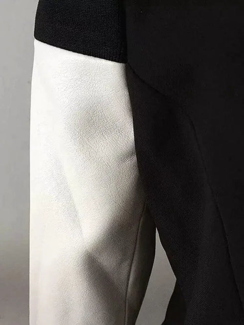 Mandotos chic leather blazer coat featuring a tailored fit, classic lapels, and stylish design, perfect for a sophisticated look.