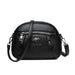 Mandotos chic leather circle purse with adjustable strap and minimalist design, perfect for casual or evening use.