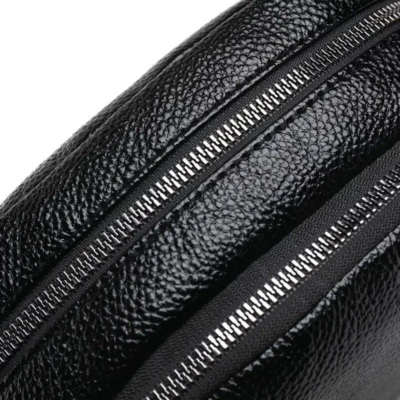 Mandotos chic leather circle purse with a sleek design and adjustable strap, perfect for stylish everyday carry.