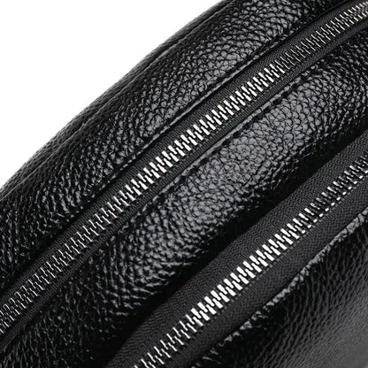 Mandotos chic leather circle purse with a sleek design and adjustable strap, perfect for stylish everyday carry.