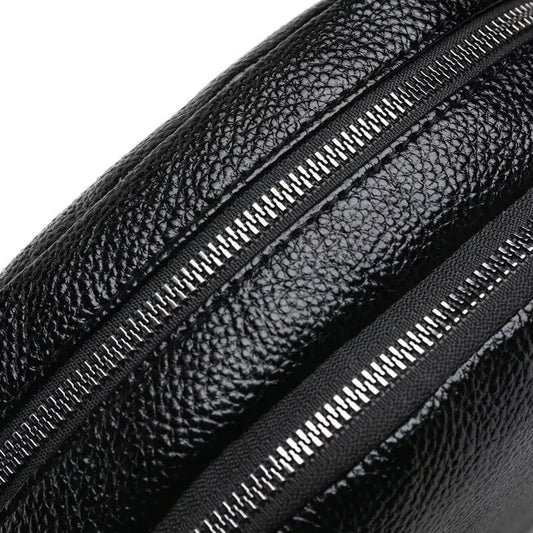 Mandotos chic leather circle purse with a sleek design and adjustable strap, perfect for stylish everyday carry.