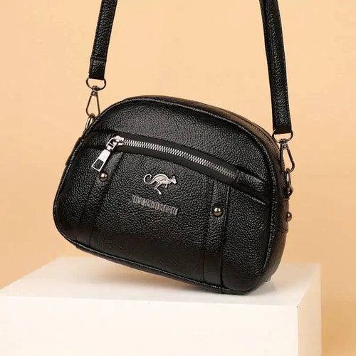 Mandotos chic leather circle purse with a stylish design and smooth finish, perfect for everyday use.