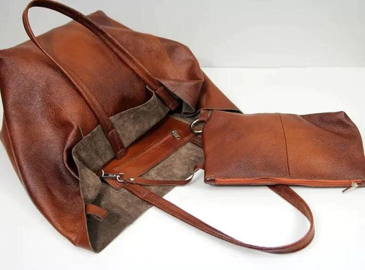 Mandotos chic leather tote handbag with sturdy handles, stylish design, and spacious interior for everyday use.