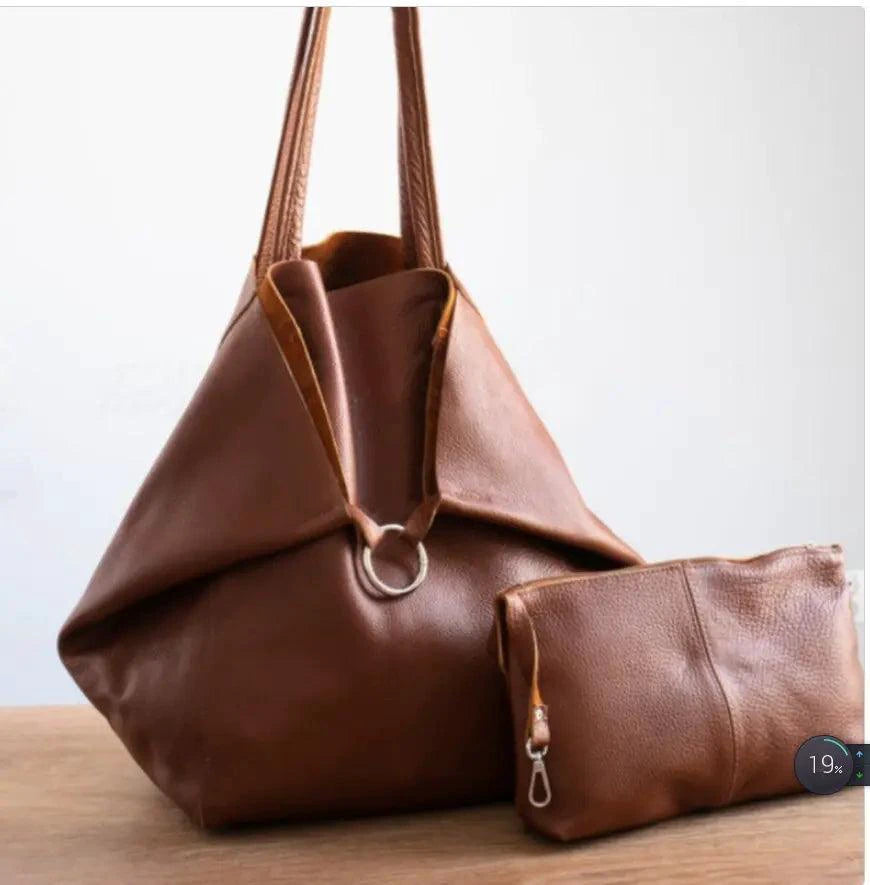 Mandotos chic leather tote handbag with sleek design, featuring sturdy handles and spacious interior for everyday use