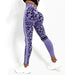Mandotos chic leopard print high-rise yoga tights showing a close-up of the stylish, comfortable fabric and leopard pattern.