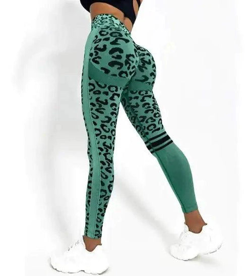 Mandotos chic leopard print high-rise yoga tights laid flat, showcasing their stylish design and comfortable fit.
