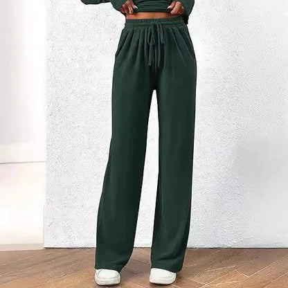 Mandotos chic long-sleeve trousers set featuring a stylish top and matching pants, perfect for casual or semi-formal wear.