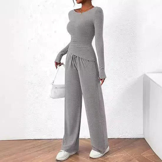 Mandotos chic long-sleeve trousers set featuring a stylish top and matching wide-leg pants, perfect for casual or semi-formal wear.