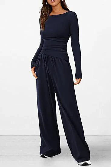 Mandotos chic long-sleeve trousers set featuring a stylish top and matching pants for a modern, sophisticated look.