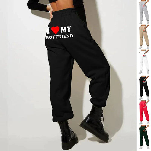 Mandotos chic love print trousers featuring a stylish pattern, tailored fit, and comfortable fabric for casual or fashionable wear.