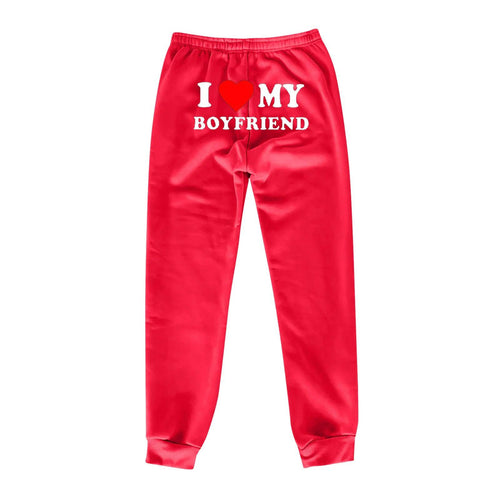 Mandotos chic love print trousers featuring stylish pattern and tailored fit, perfect for casual or semi-formal wear.