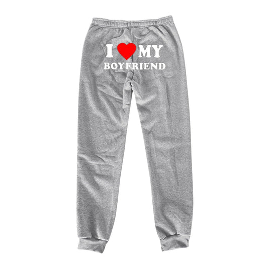 Mandotos chic love print trousers featuring stylish design and comfortable fit, perfect for casual or semi-formal wear.