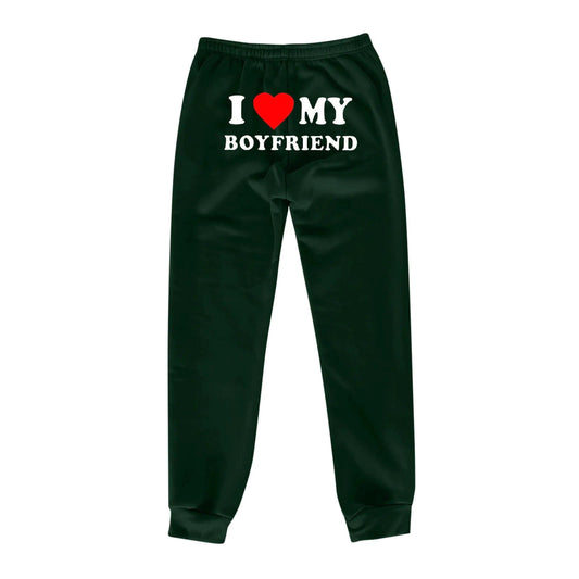 Mandotos Chic Love Print Trousers featuring a stylish heart pattern, slim fit design, and comfortable fabric for casual wear.