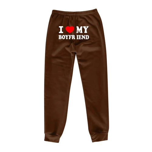 Mandotos chic love print trousers featuring a stylish pattern, relaxed fit, and comfortable fabric, perfect for casual or trendy outfits.