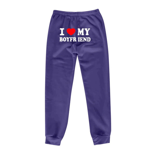 Mandotos Chic Love Print Trousers featuring stylish love-themed pattern, slim fit design, and comfortable fabric for casual wear.