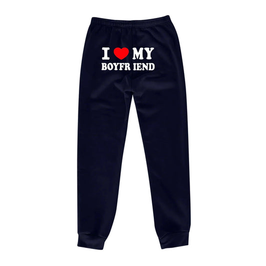 Mandotos Chic Love Print Trousers featuring a stylish floral pattern and comfortable fit, perfect for casual or semi-formal wear.