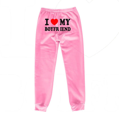 Mandotos chic love print trousers featuring stylish, comfortable fabric with a bold love pattern, perfect for casual or trendy outfits.