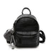 Mandotos chic mini leather backpack with top handle and adjustable straps, featuring a sleek design and compact size.